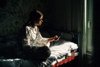 Portrait of a teenage girl with mobile phone.